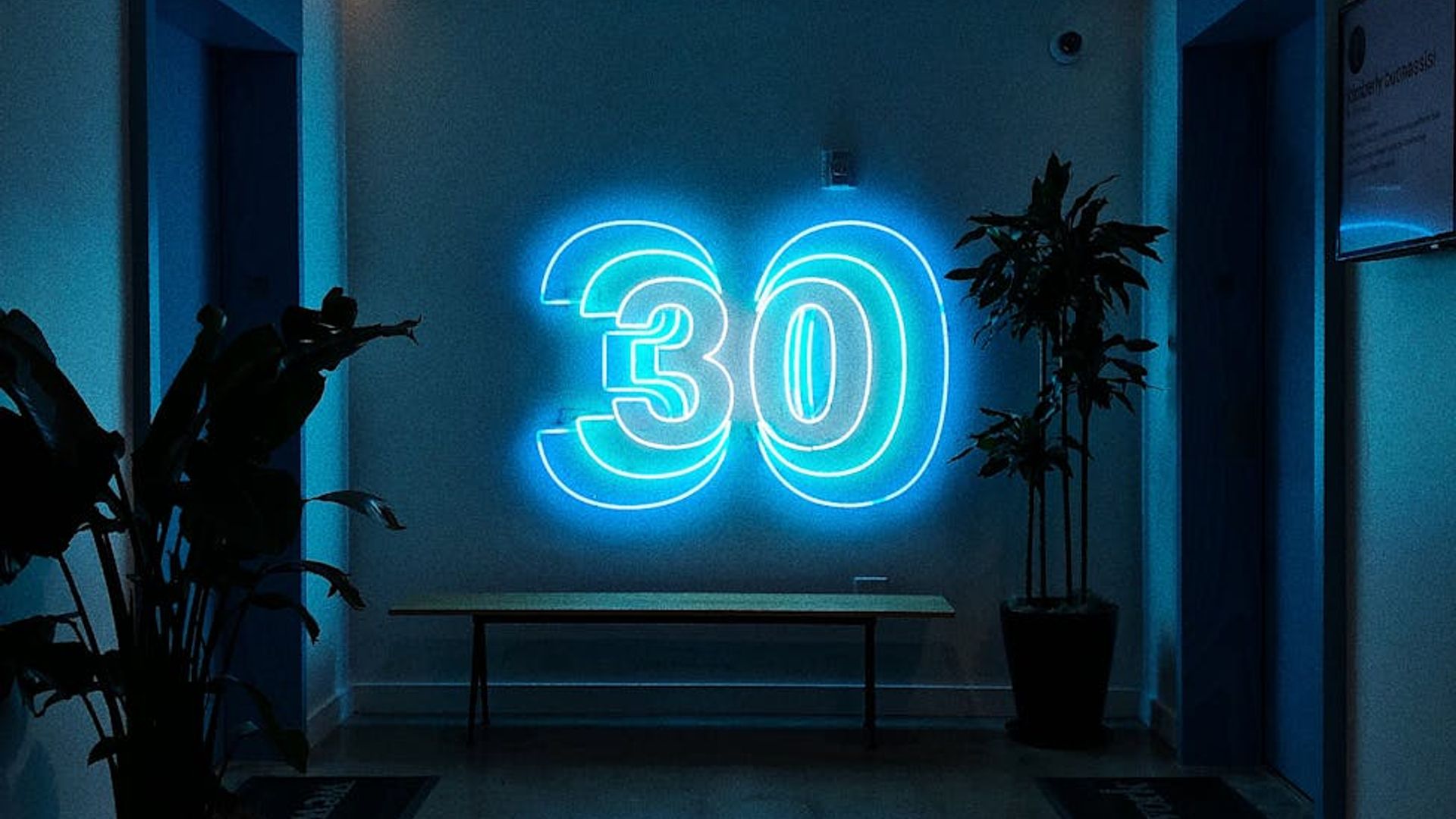 Minimalist dark room with blue neon accents for focus